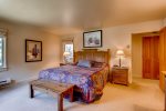 Master bedroom features a king bed